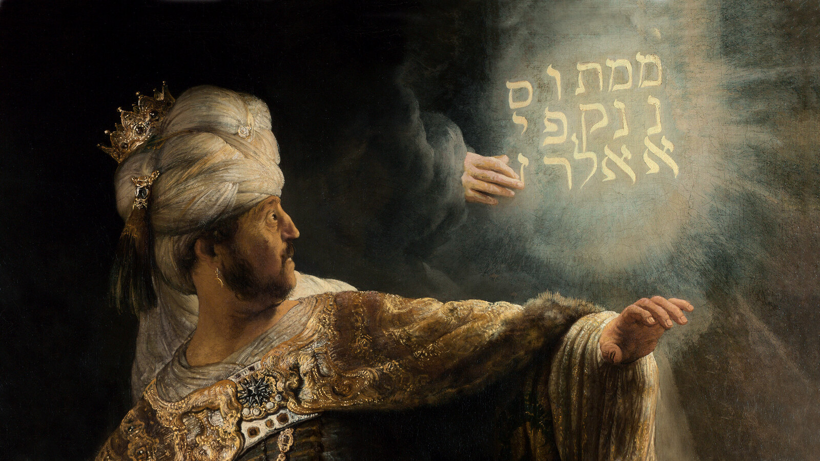 Belshazzar sees the handwriting on the wall — glowing Hebrew letters — Rembrandt